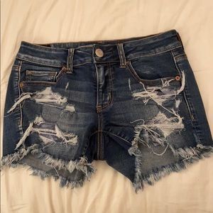 American Eagle Dark Washed Jeans with rips